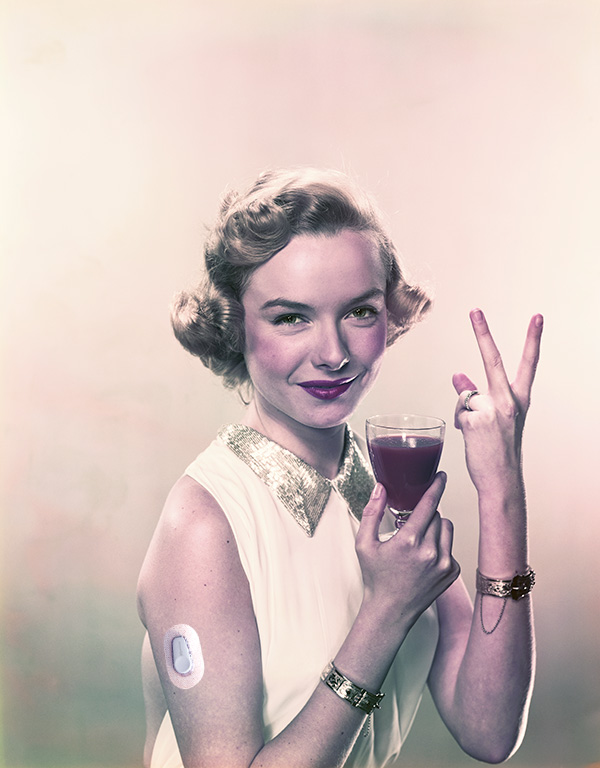 retro picture of young woman holding a glass of wine and giving the peace sign wearing a photoshoped Dexcom g6 cgm sensor