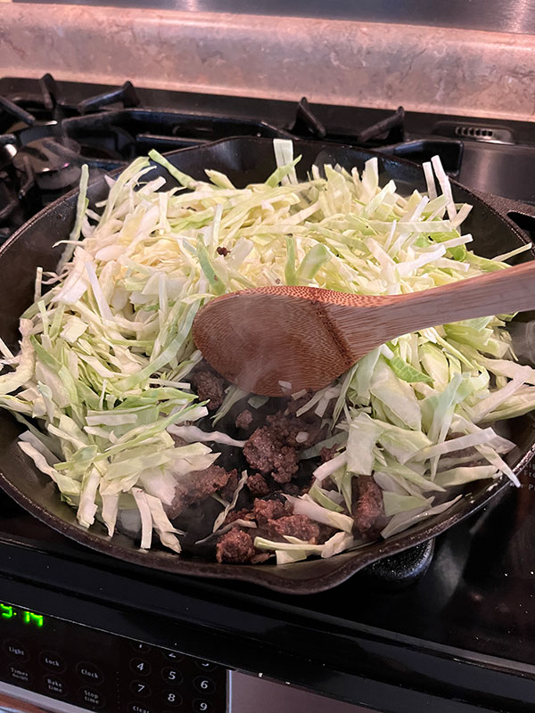 healthy egg roll in a bowl wilting cabbage